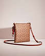 COACH®,UPCRAFTED KITT MESSENGER CROSSBODY IN COLORBLOCK SIGNATURE CANVAS,Pebble Leather,Medium,Brass/Tan/Rust,Angle View
