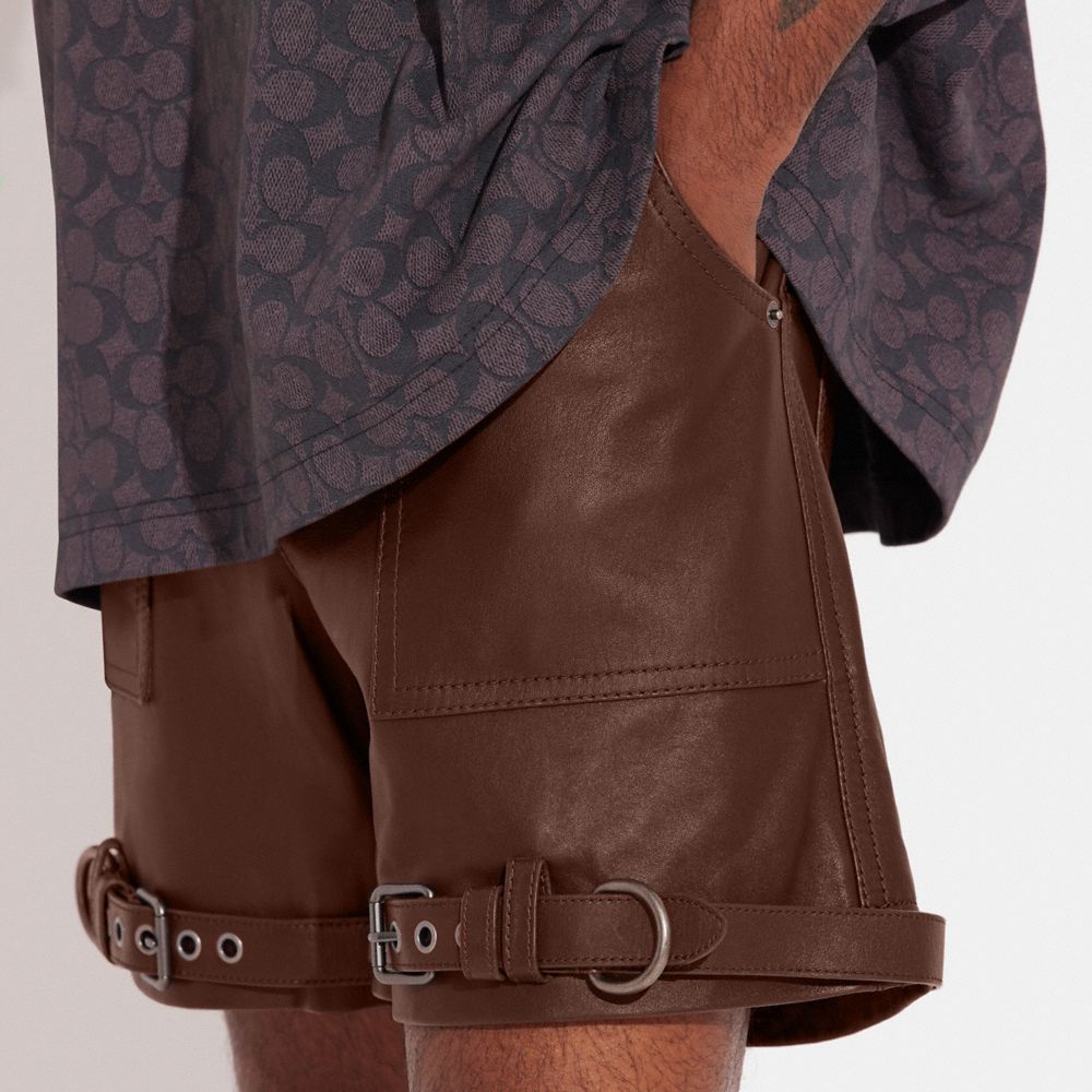 COACH®  Distressed Leather Shorts