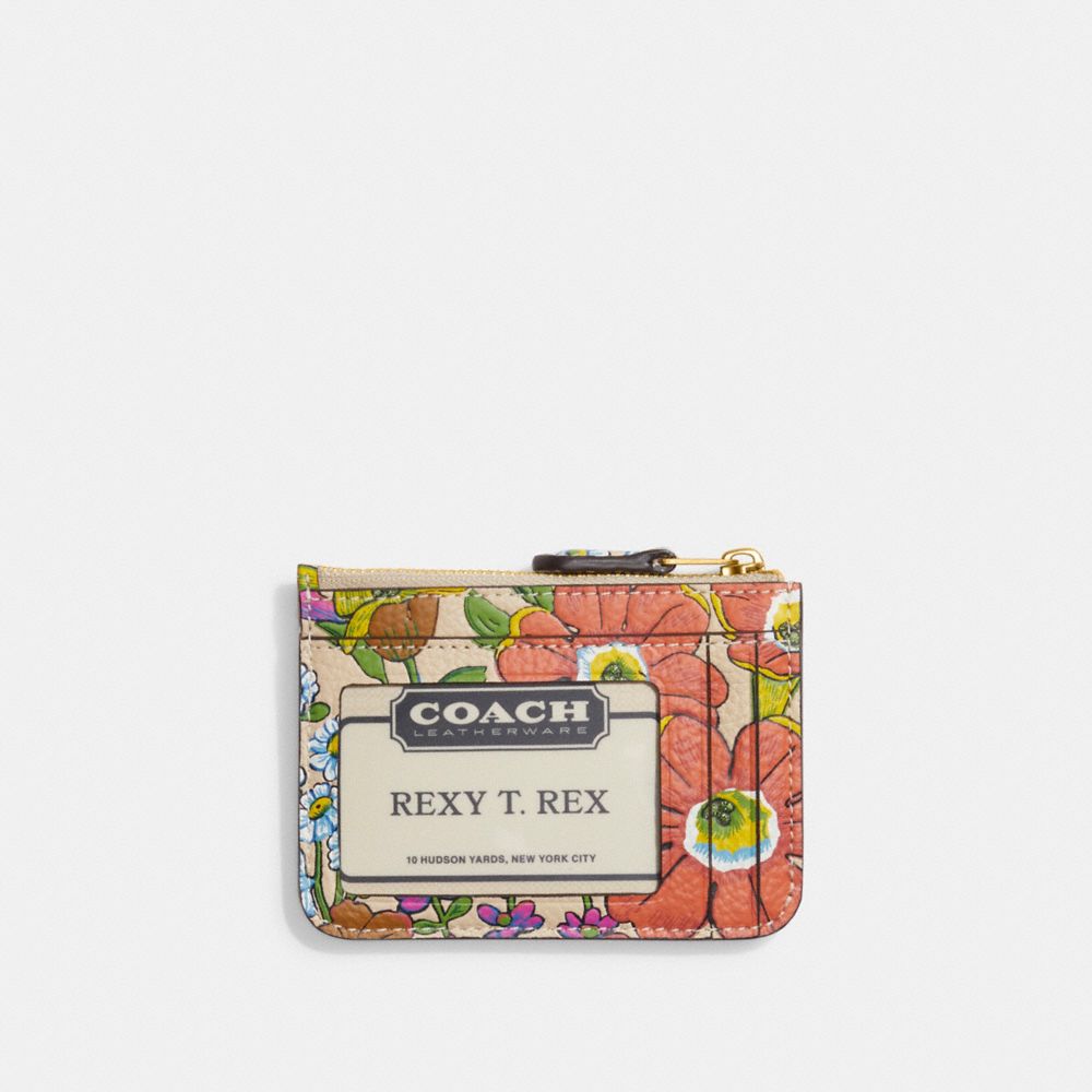 COACH®,MINI SKINNY ID CASE WITH FLORAL PRINT,Pebble Leather,Mini,Brass/Ivory Multi,Back View
