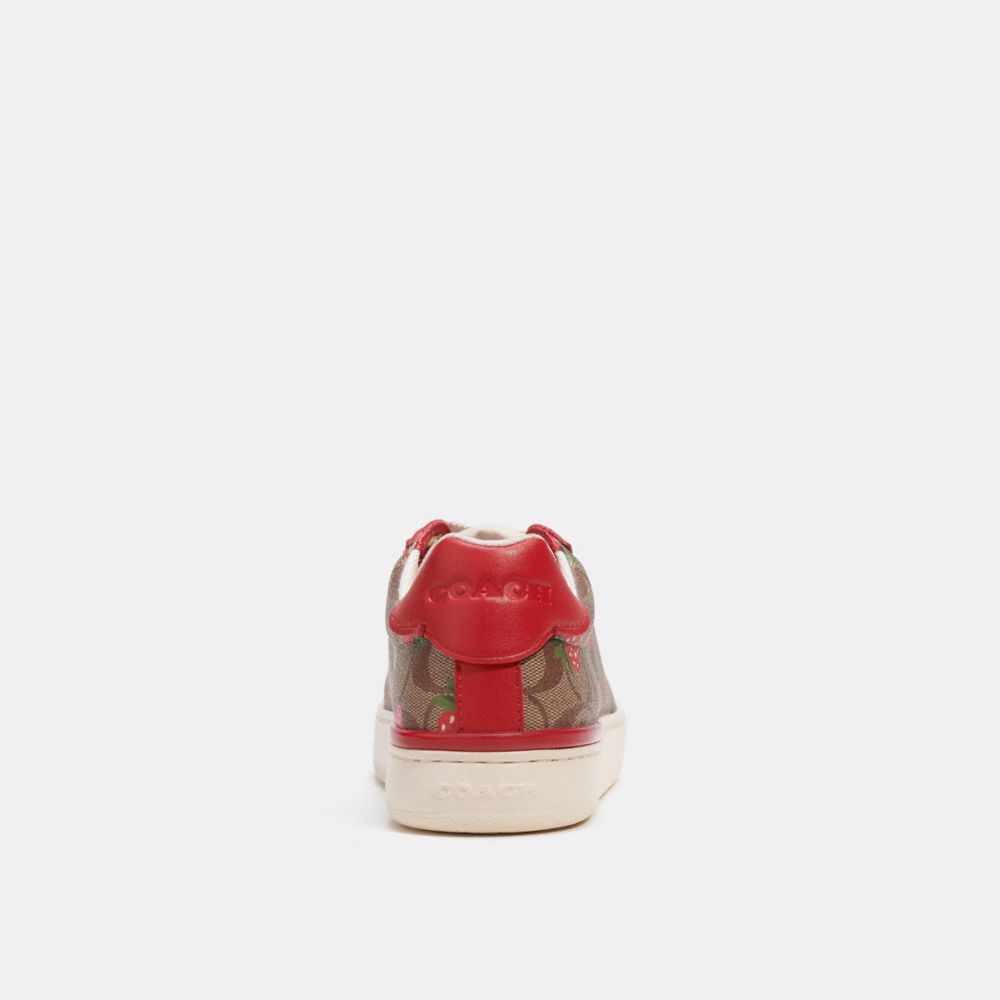 COACH® | Clip Low Top Sneaker In Signature Canvas With Wild Strawberry Print