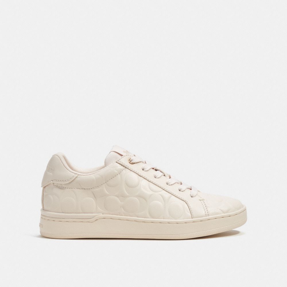 COACH®,CLIP LOW TOP SNEAKER IN SIGNATURE LEATHER,Chalk,Angle View