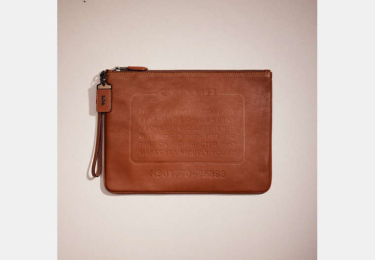 COACH®,RESTORED POUCH WITH STORYPATCH,Saddle,Front View