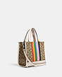 COACH®,DEMPSEY TOTE 22 IN SIGNATURE JACQUARD WITH RAINBOW STRIPE AND COACH PATCH,Jacquard,Medium,Silver/Khaki Multi,Angle View