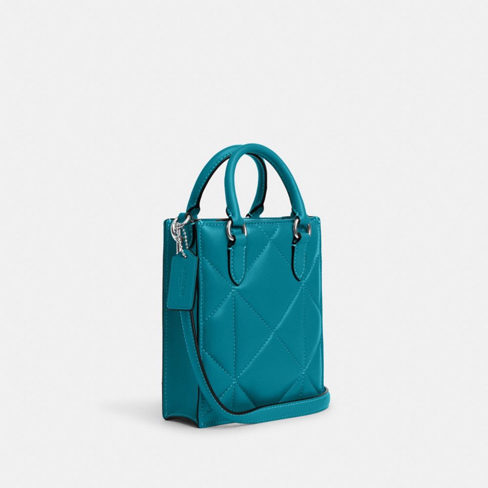 COACH®,NORTH SOUTH MINI TOTE WITH PUFFY DIAMOND QUILTING,Novelty Leather,Mini,Silver/Teal,Angle View