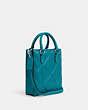 COACH®,NORTH SOUTH MINI TOTE WITH PUFFY DIAMOND QUILTING,Leather,Mini,Silver/Teal,Angle View