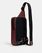 COACH®,SULLIVAN PACK IN SIGNATURE LEATHER,Leather,Medium,Gunmetal/Wine Multi,Angle View