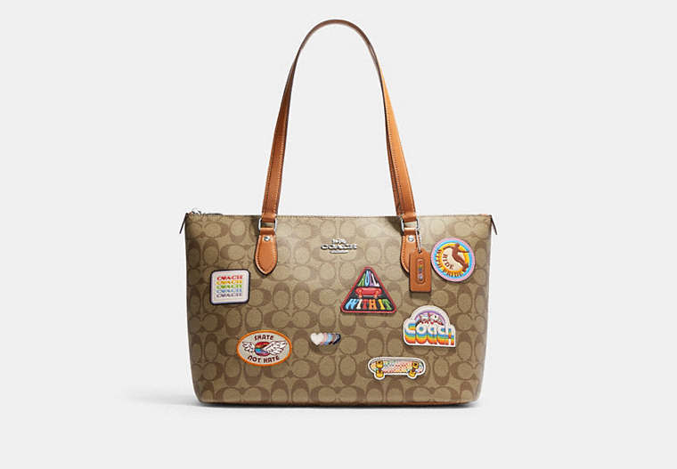 COACH®,GALLERY TOTE BAG IN SIGNATURE CANVAS WITH PATCHES,canvas,Large,Silver/Khaki Multi,Front View