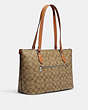 COACH®,GALLERY TOTE BAG IN SIGNATURE CANVAS WITH PATCHES,canvas,Large,Silver/Khaki Multi,Angle View