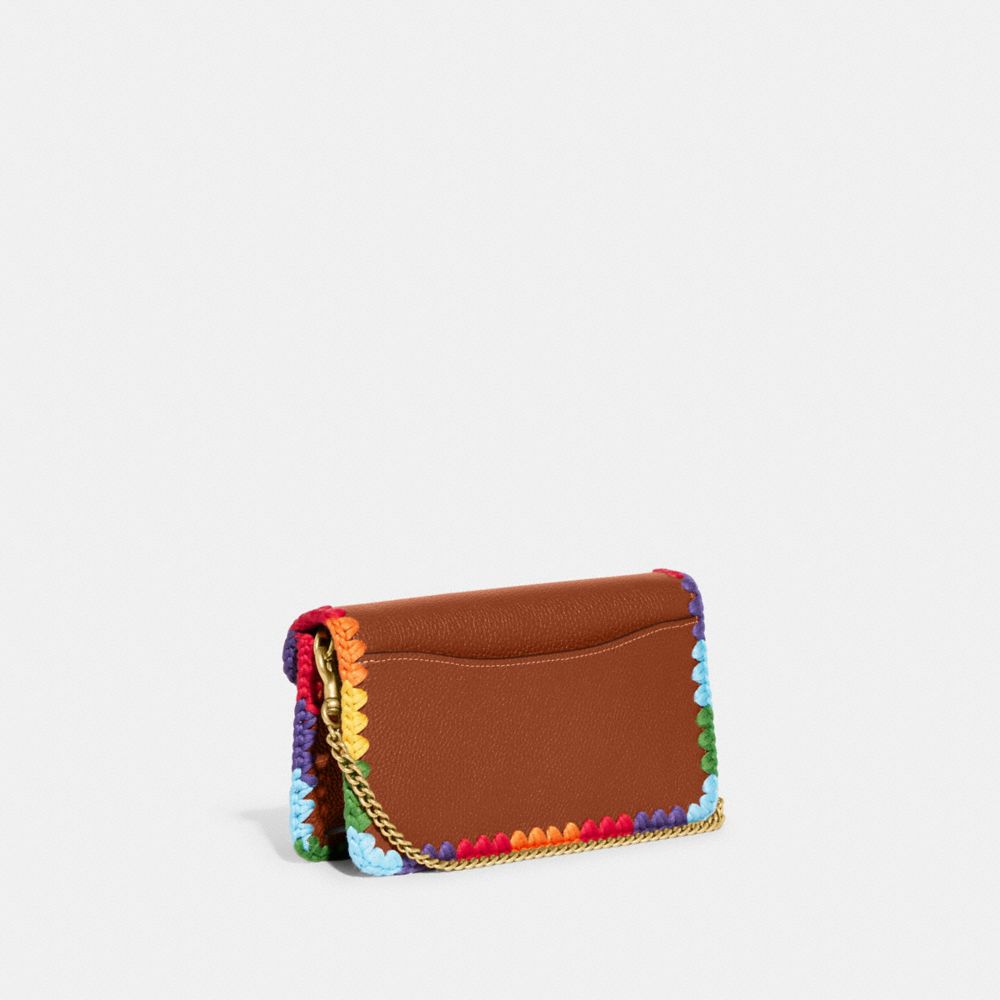 COACH®,TABBY CHAIN CLUTCH WITH RAINBOW CROCHET,Polished Pebble Leather,Mini,Brass/Burnished Amber Multi,Angle View