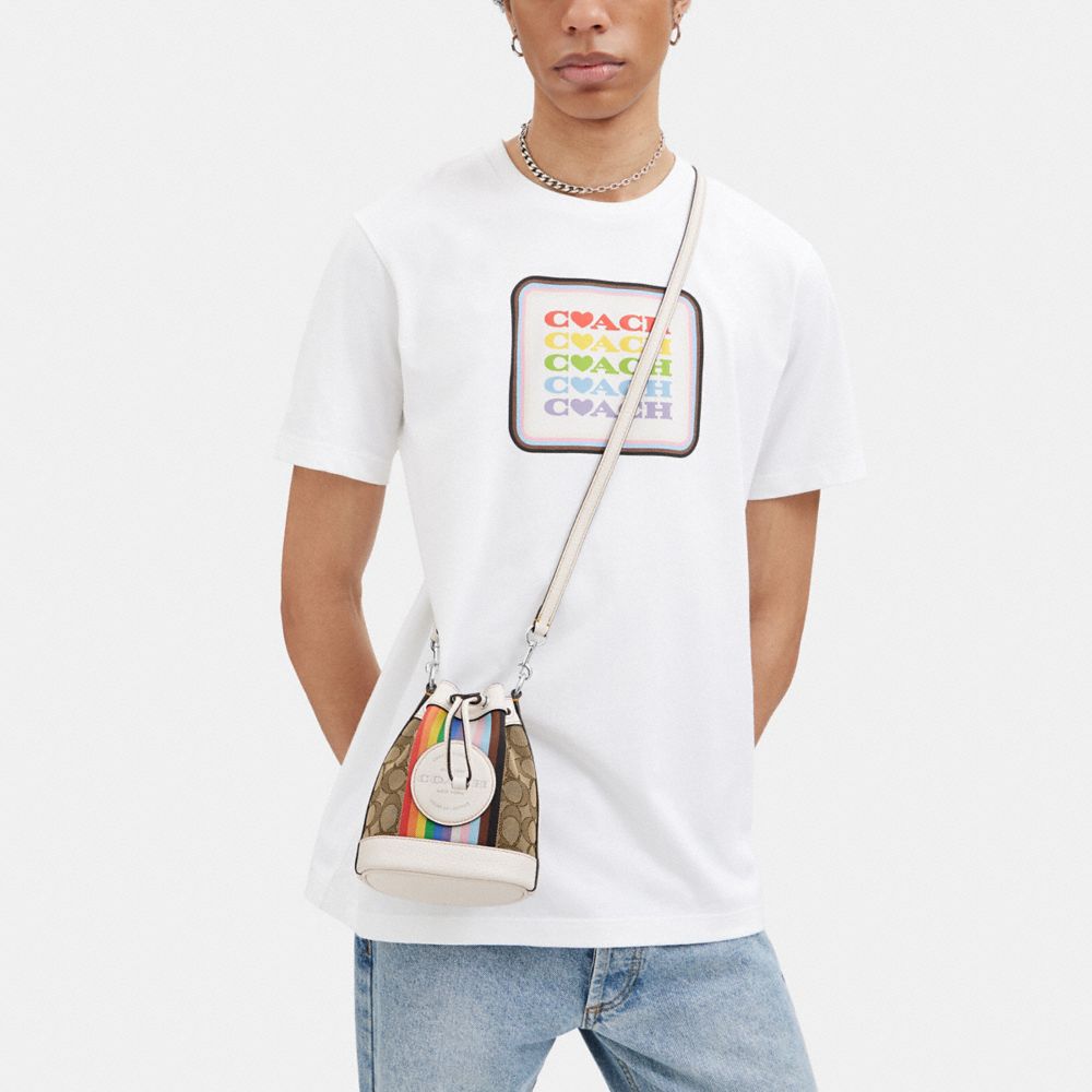 COACH®,Mini Dempsey Bucket Bag In Signature Jacquard With Rainbow Stripe And Coach Patch,,Detail View