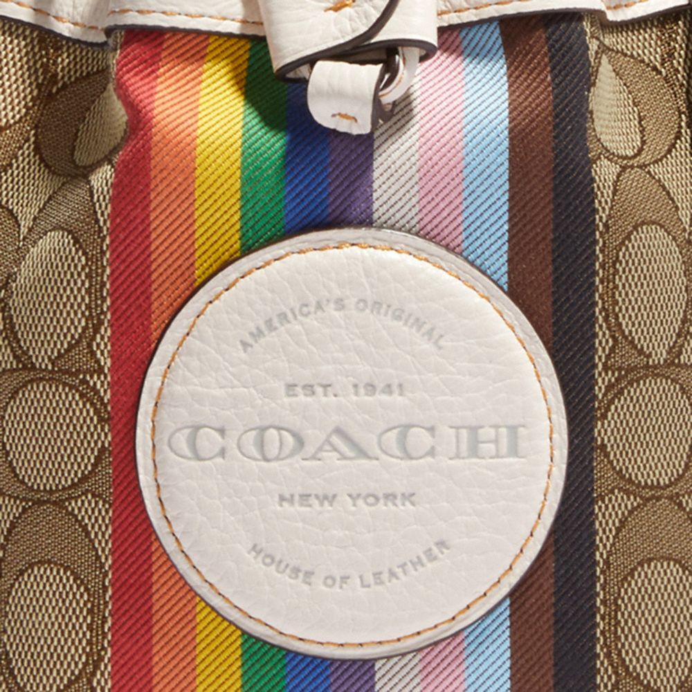 COACH®,Mini Dempsey Bucket Bag In Signature Jacquard With Rainbow Stripe And Coach Patch,,Detail View