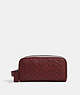 COACH®,LARGE TRAVEL KIT IN SIGNATURE LEATHER,Leather,Medium,Gunmetal/Wine Multi,Front View