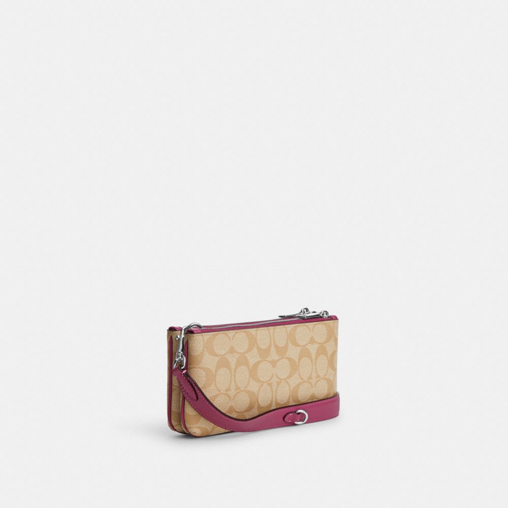 COACH®,Double Zip Crossbody Bag In Signature Canvas,,Angle View