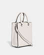 COACH®,TOTE 16 WITH SIGNATURE CANVAS DETAIL,Crossgrain Leather,Medium,Chalk,Angle View
