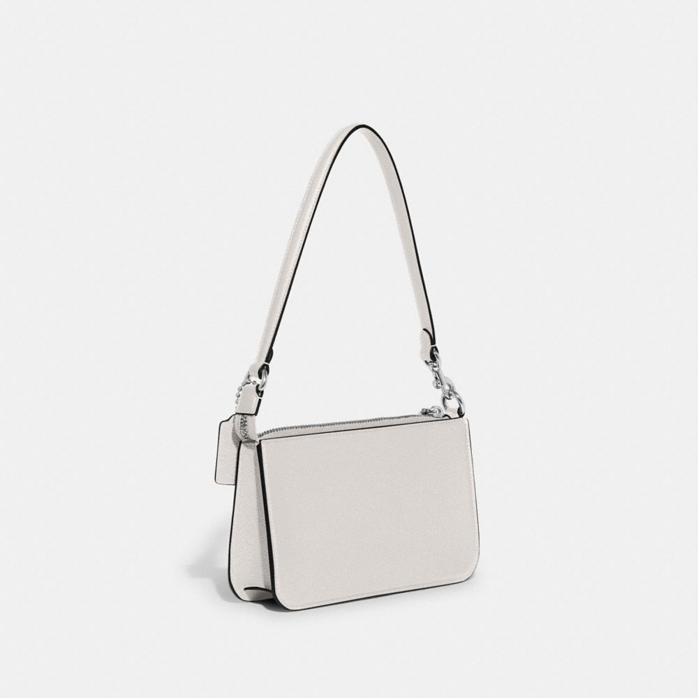 COACH®,SAC POCHETTE AVEC TOILE SIGNATURE,Cuir Cross-grain,Craie,Angle View