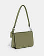 COACH®,POUCH BAG WITH SIGNATURE CANVAS,Crossgrain Leather,Mini,Moss,Angle View