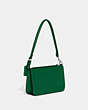 COACH®,POUCH BAG WITH SIGNATURE CANVAS,Crossgrain Leather,Mini,Green,Angle View