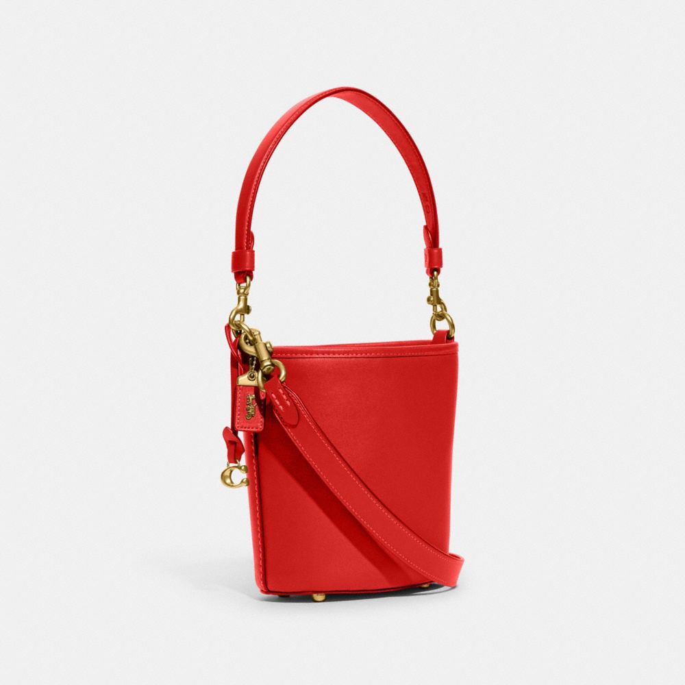 COACH®,DAKOTA BUCKET BAG 16,Glovetan Leather,Medium,Brass/Sport Red,Angle View