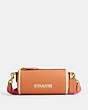 COACH®,ORION BARREL BAG,Polished Pebble Leather,Medium,Brass/Faded Orange,Front View
