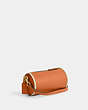 COACH®,ORION BARREL BAG,Refined Pebble Leather,Medium,Brass/Faded Orange,Angle View