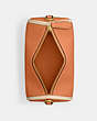COACH®,ORION BARREL BAG,Polished Pebble Leather,Medium,Brass/Faded Orange,Inside View,Top View