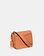 COACH®,TABBY MESSENGER 19,Polished Pebble Leather,Small,Brass/Faded Orange,Angle View