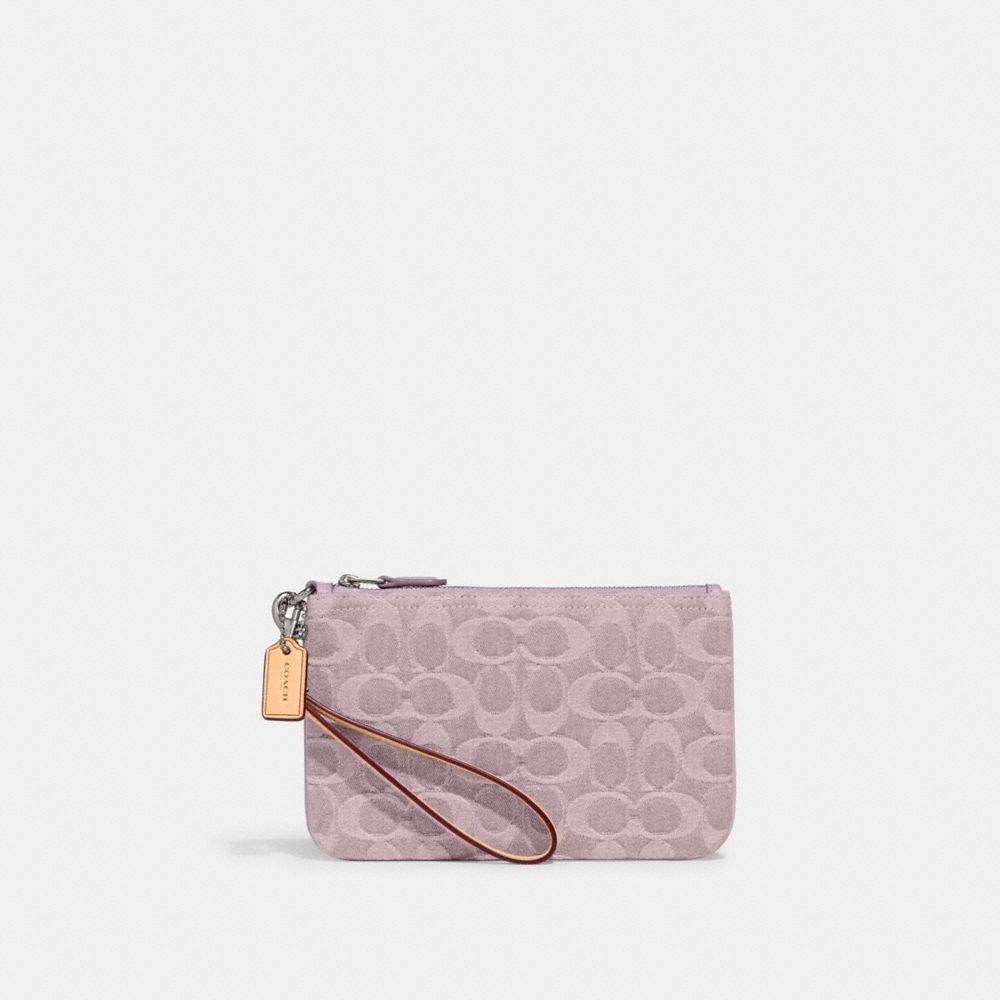 COACH®,SMALL WRISTLET IN SIGNATURE DENIM,Denim,Silver/Pale Purple,Front View image number 0