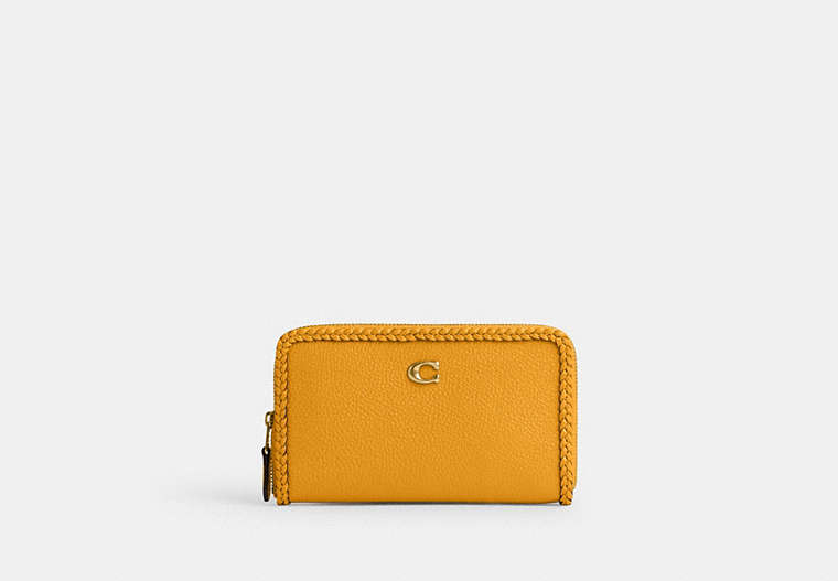 COACH®,MEDIUM ZIP AROUND WALLET WITH BRAID,Polished Pebble Leather,Small,Brass/Buttercup,Front View