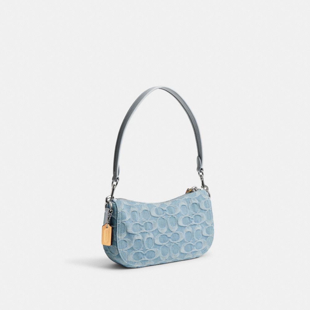 COACH®,SWINGER BAG 20 IN SIGNATURE DENIM,Denim,Small,Silver/Pale Blue,Angle View