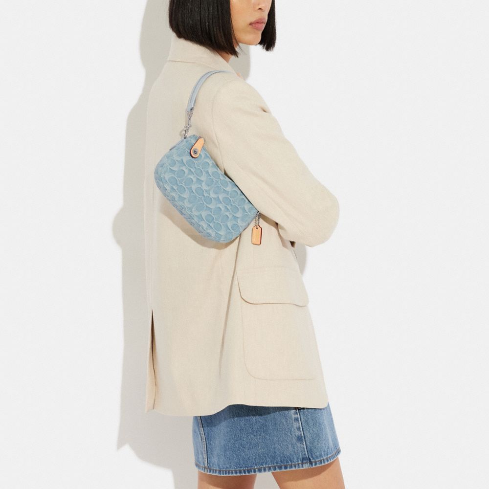 COACH®,Swinger Bag 20 In Signature Denim,,Detail View