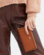 COACH®,ACCORDION ZIP WALLET WITH BRAID,Polished Pebble Leather,Small,Brass/Burnished Amber,Detail View