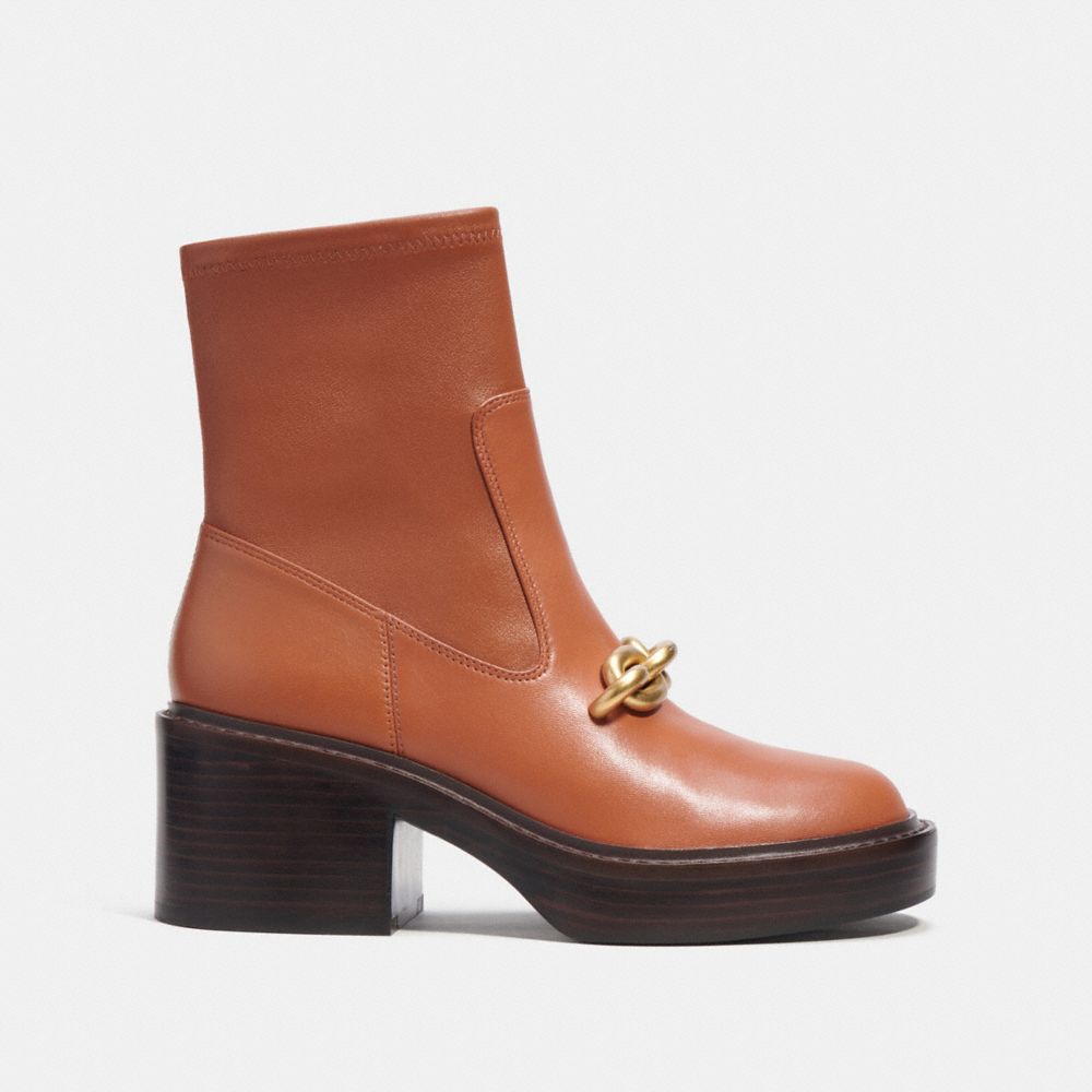 COACH®,Kenna Bootie,Lining Leather,Leather,Rubber,Bootie,Chain Detail,Gold Metal,Casual,Brown,Angle View