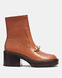 COACH®,KENNA BOOTIE,Leather,Burnished Amber,Angle View