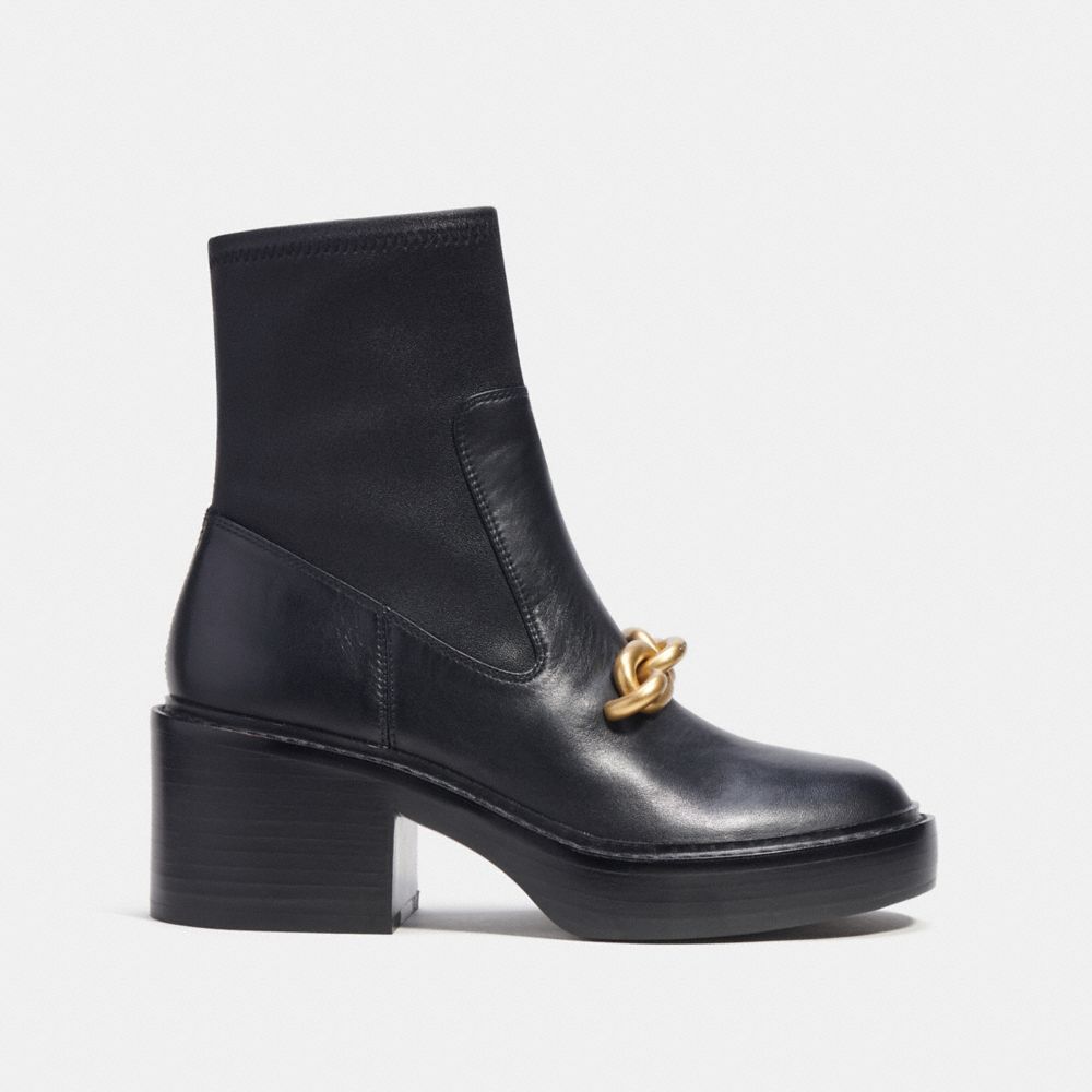 COACH®,Kenna Bootie,Lining Leather,Leather,Rubber,Bootie,Chain Detail,Gold Metal,Casual,Black,Angle View