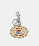 COACH®,SKATE NOT HATE BAG CHARM IN RAINBOW SIGNATURE CANVAS,Silver/Chalk Multi,Front View