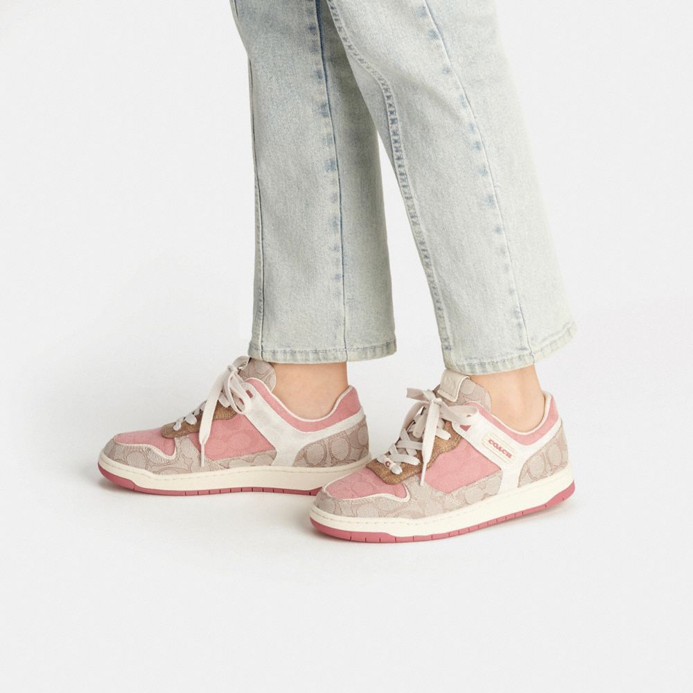 Coach c11 low on sale top sneaker pink