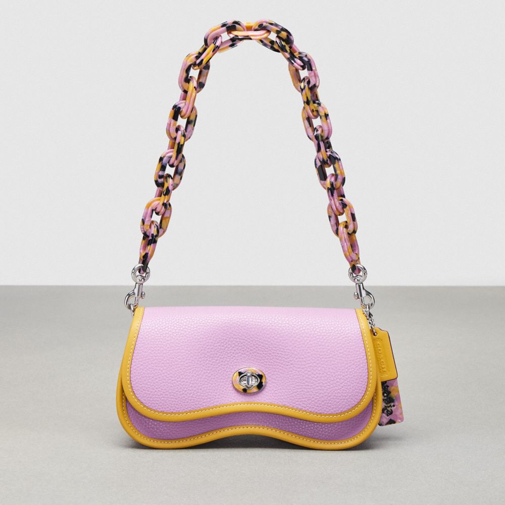 COACH®,Wavy Dinky Bag With Crossbody Strap,Coachtopia Leather,Small,Violet Orchid/Flax,Front View image number 0