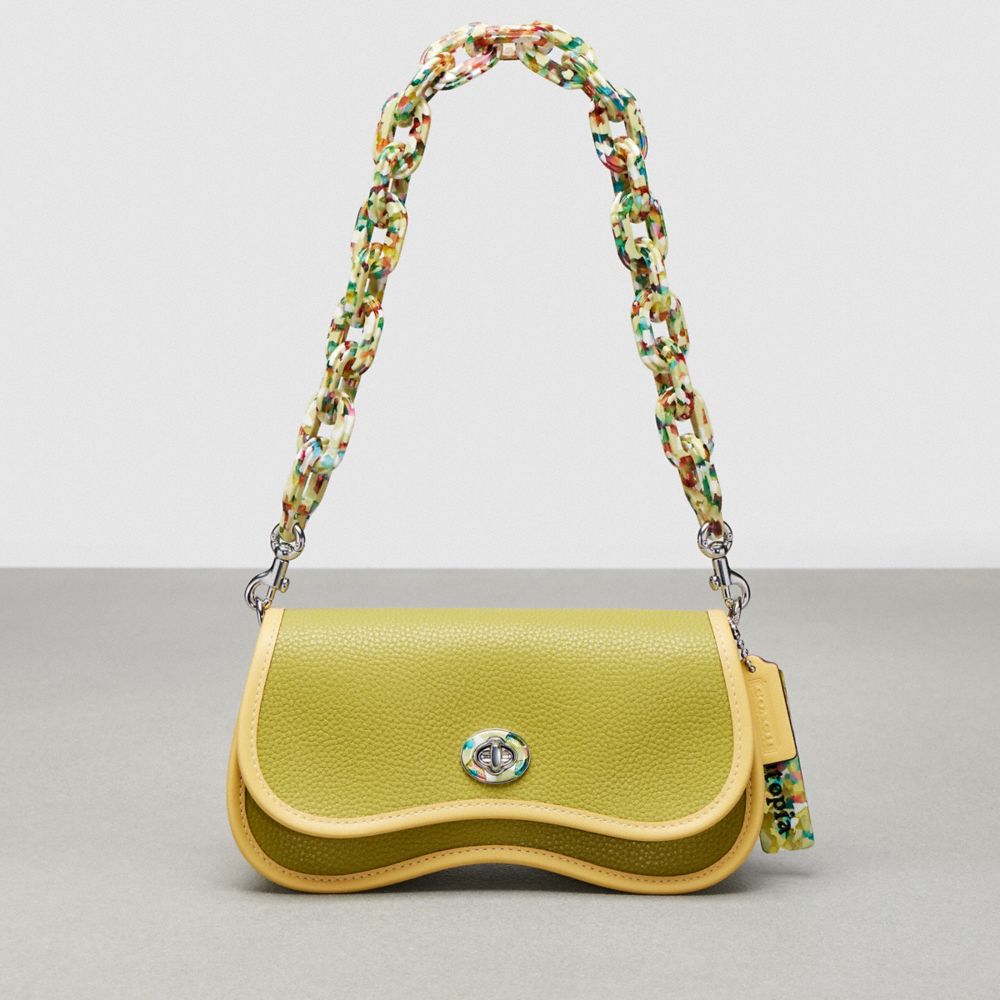 COACH®,Wavy Dinky Bag With Crossbody Strap,Coachtopia Leather,Small,Lime Green/Sunflower,Front View image number 0
