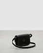 COACH®,Wavy Wallet with Crossbody Strap,Coachtopia Leather,Black,Angle View