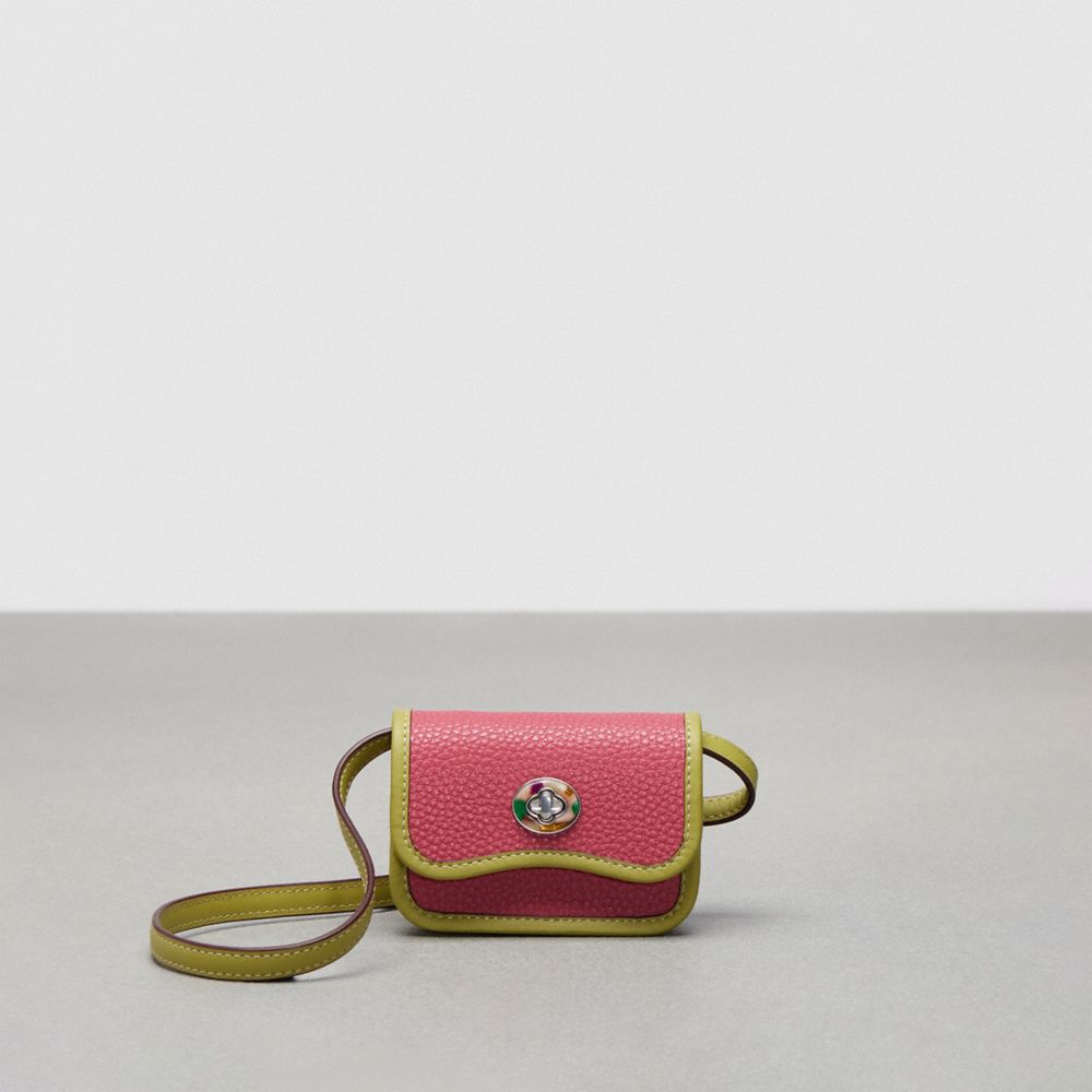 COACH®,Wavy Wallet With Crossbody Strap,Coachtopia Leather,Mini,Strawberry Haze/Lime Green,Front View image number 0