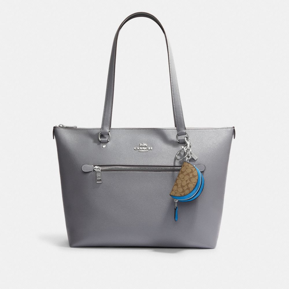 COACH®,MINI HALF MOON BAG CHARM IN SIGNATURE CANVAS,Mini,Silver/Khaki/Racer Blue,Angle View