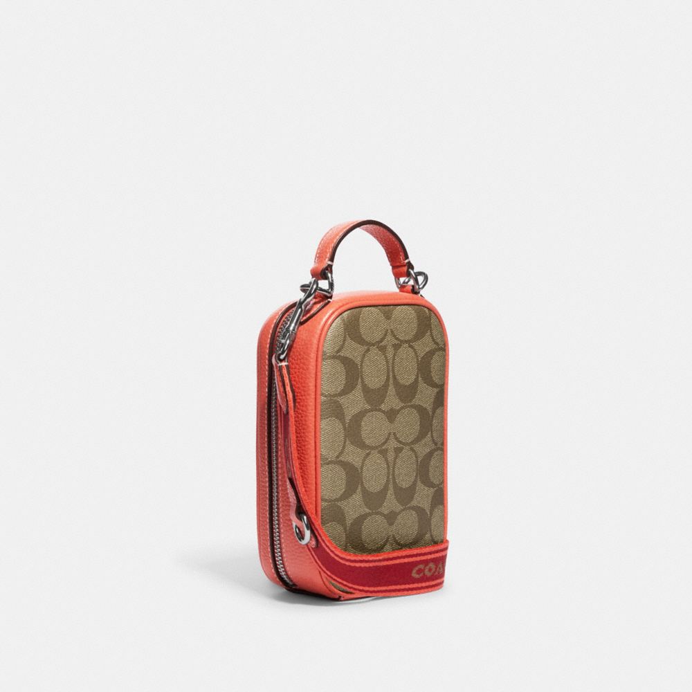 COACH®,Eva Phone Crossbody In Signature Canvas,,Angle View