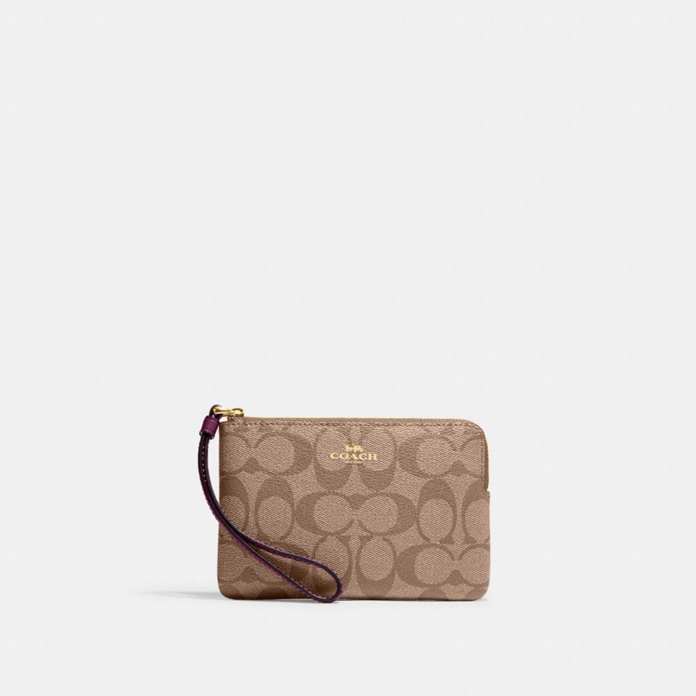 COACH®,CORNER ZIP WRISTLET IN SIGNATURE CANVAS,pvc,Gold/Khaki/Deep Berry,Front View