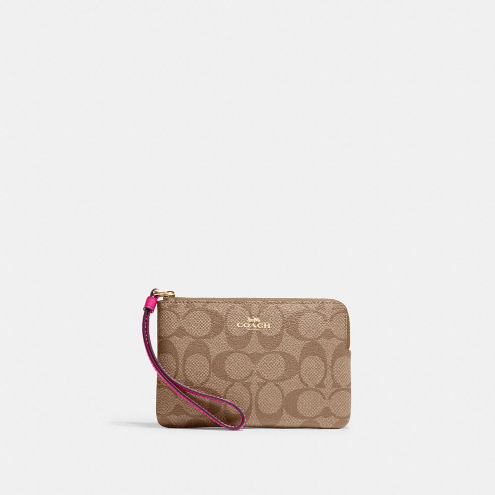 COACH®,CORNER ZIP WRISTLET IN SIGNATURE CANVAS,Signature Canvas,Mini,Im/Khaki/Cerise,Front View