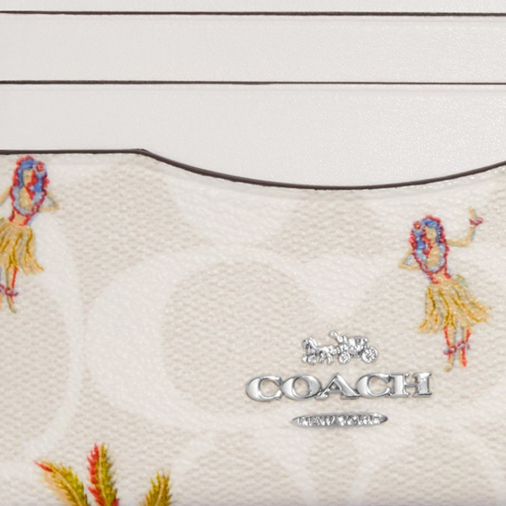 Coach Outlet Mini Rowan Crossbody In Signature Canvas With Hula Print In  Silver/chalk/glacier White Multi