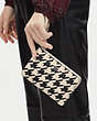 COACH®,CORNER ZIP WRISTLET WITH HOUNDSTOOTH PRINT,Mixed Material,Mini,Silver/Cream/Black,Detail View