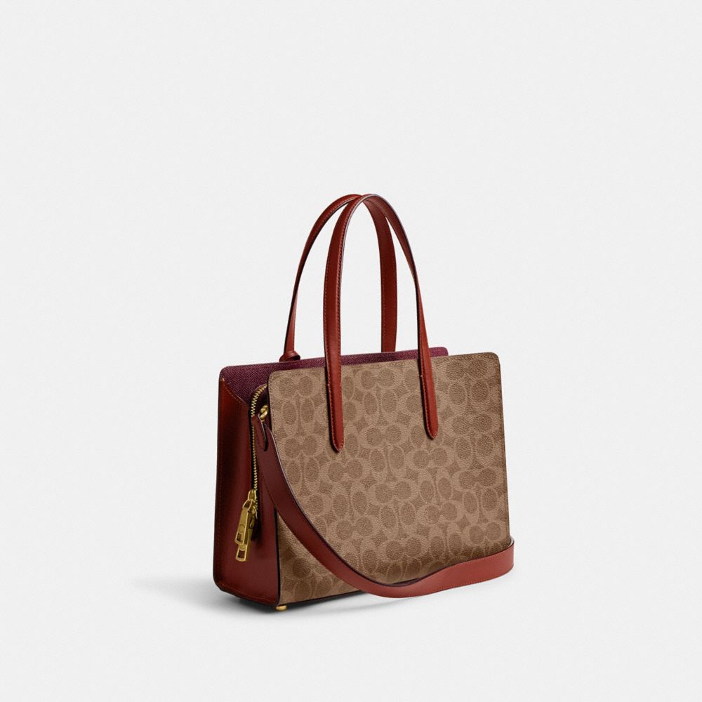 COACH®,CARTER CARRYALL BAG 28 IN SIGNATURE CANVAS,Coated Canvas,Medium,Brass/Tan/Rust,Angle View