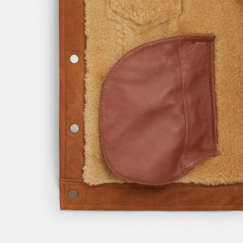 COACH®,シアリング トラッカー ジャケット,ジャケット&コート,ﾀﾞｰｸ ｻﾄﾞﾙ