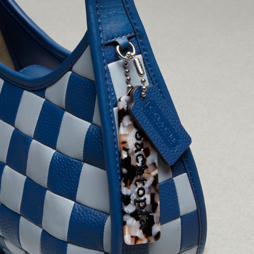 Ergo Bag In Coachtopia Leather With Cherry Print | Coachtopia ™