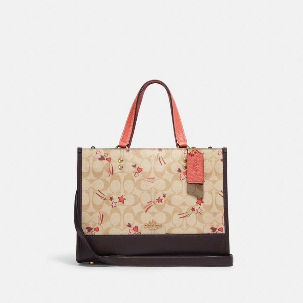 COACH® | Dempsey Carryall In Signature Canvas With Heart And Star